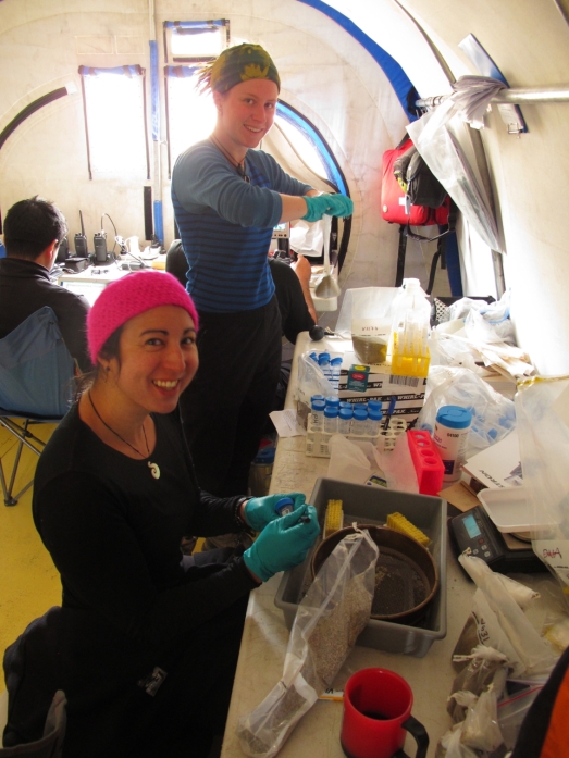 Alia and Kristi working with samples in the field lab at base camp